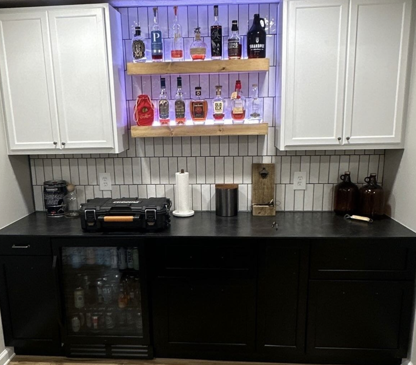 Custom home bar with illuminated shelving